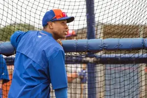 New York Mets outfielder Curtis Granderson gets ready