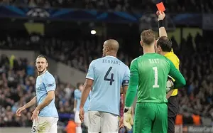 Martin Demichelis is shown the red card by Jonas Eriksson during Manchester City's Champions League defeat to Barcelona