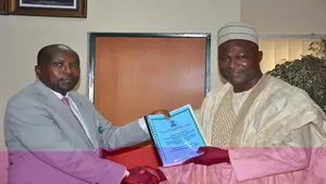 Left, Dr. Vincent Onome Akpotaire