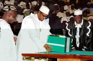 PIC. 4. PRESIDENT MUHAMMADU BUHARI (L), PRESENTING THE 2016 APPROPRATION BILL TO A JOINT SESSION OF THE NATIONAL ASSEMBLY IN ABUJA ON TUESDAY (22/12/15). LEFT IS THE SENIOR SPECIAL ASSISTANT TO THE PRESIDENT ON NATIONAL ASSEMBLY MATTAERS (SENATE), SEN. ITA EG AND CLERK OF THE NATIONAL ASSEMBLY, ALHAJI SALISU MAIKASUWA. 7803/22/12/2016/ICE/BJO/