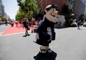 The San Diego Padres Friar mascot arrives prior