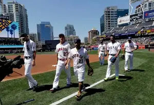 American League players take the field during batting
