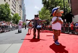 Team mascots arrive prior to the MLB baseball