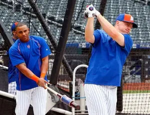 Jay Bruce #19 and Yoenis Cespedes #52 of