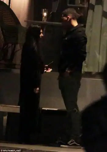 Let's talk: Younes gazed down towards his petite gal pal