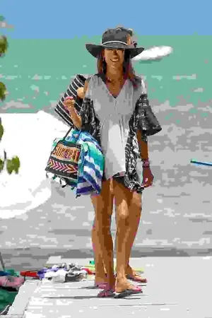 With clothes on: The Louis Vuitton model with a print dress and flip flops