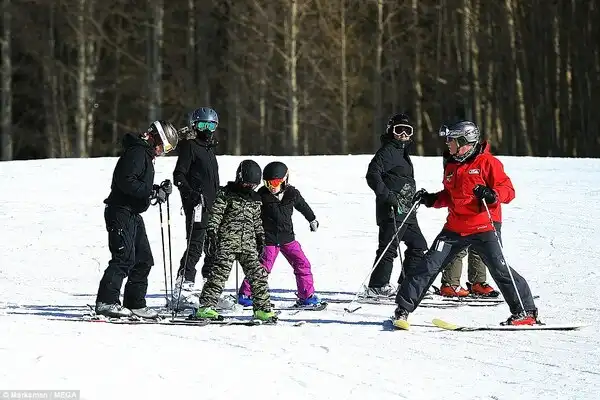The whole gang! Angelina and the group gathered for a debrief at the bottom of the mountain 