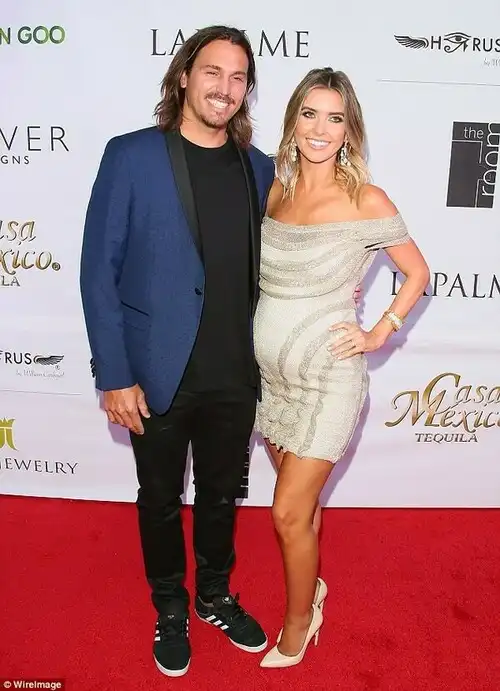 And baby bump makes three: Corey and Audrina at an event in Los Angeles last March, just three months before Kirra was born