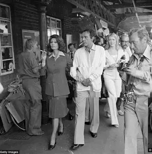 On-screen love: Sophia Loren and Burton are seen in 1974 on the set of The Voyage