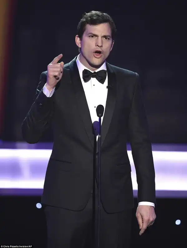 'We welcome you': Ashton Kutcher began the show by slamming the recent executive order made by Donald Trump