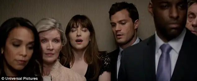 Dramatic climax: Just as the scene reaches its peak of intensity, the elevator lands at their desired floor and everybody spills out