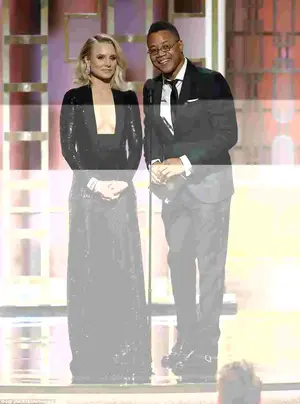 Star-studded: Kristen Bell and Cuba Gooding Jr had  a bit of fun as they presented