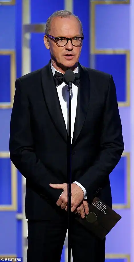 Dapper: John Legend and Michael Keaton looked handsome in their tuxedos