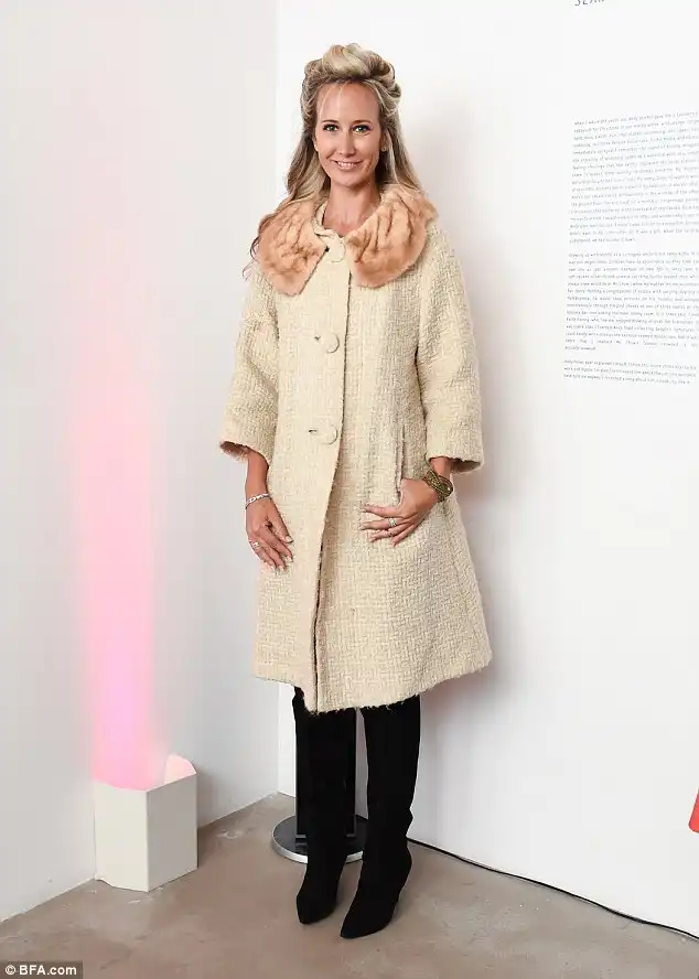 Cream colored dream: Lady Victoria Hervey looked elegant in a fur-collared coat