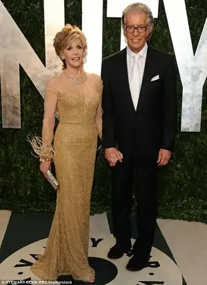 The early days of their love: The actress and the music man at the Vanity Fair Oscar party in 2012 after they had been dating for three years