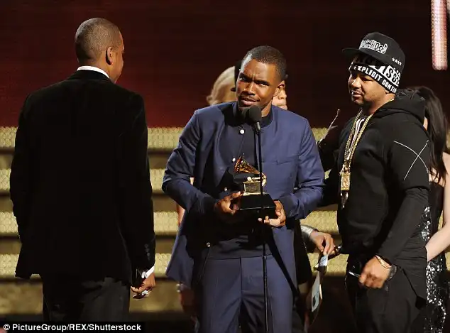 Not interested: Frank Oceanseen picking up a Grammy in 2013says the 'system is dated' and claims there needs to be a better representation of the black community