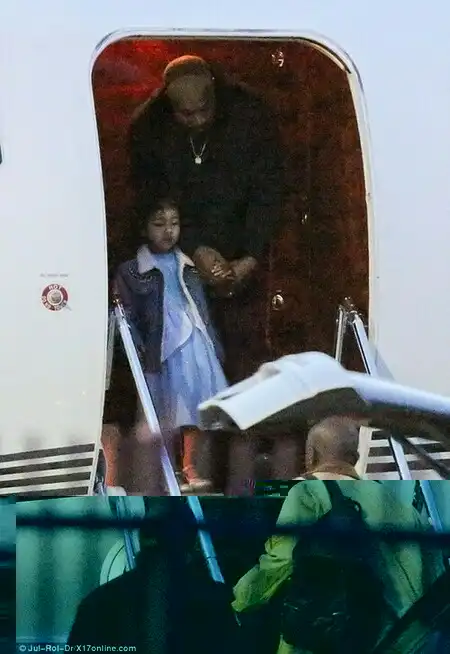 Helping hand: Kanye was joined by three-year-old daughter North West