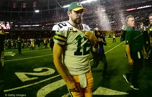 Tough: The actress penned a thank you letter to Green Bay Packers fans after their loss against the Atlanta Falcons in the NFC Championship game; Aaron moments after the game ended
