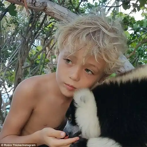 Caught in the middle: Julian is the only child of the Blurred Lines singer and the actress who filed for divorce in October 2014 and has accused her ex of being abusive