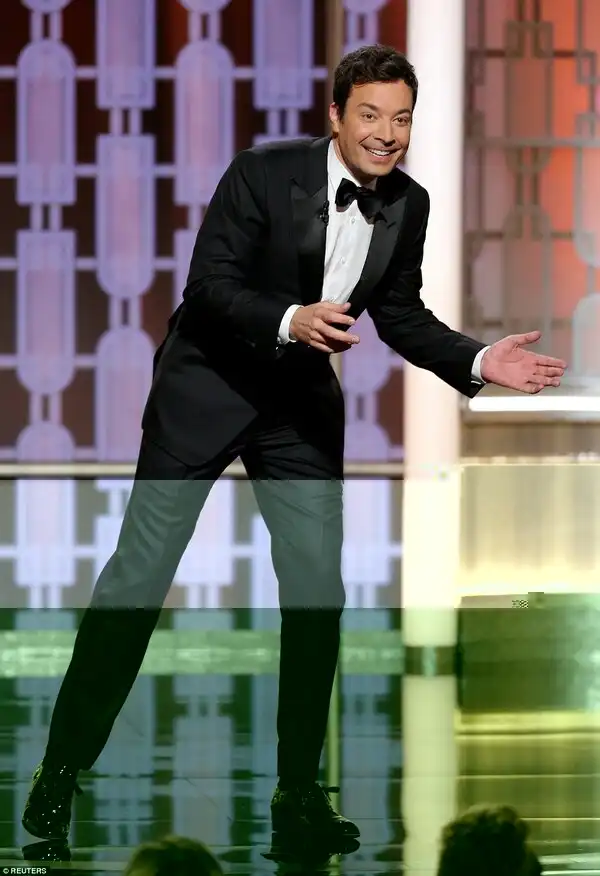 Tough times: The show was kicked off by host Jimmy Fallon who had a rough time at first as the teleprompter went down during the monologue