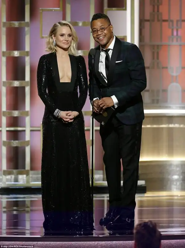 Star-studded: Kristen Bell and Cuba Gooding Jr had  a bit of fun as they presented
