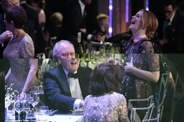 Bonding time: Claire and John were seen enjoying a laugh together during the event