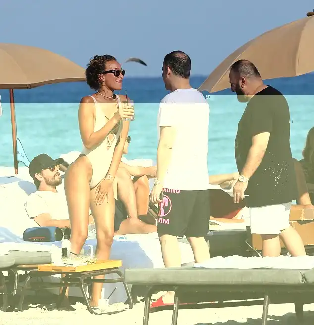 Curves on show: It's no surprise the beach babe caught Scott's eye