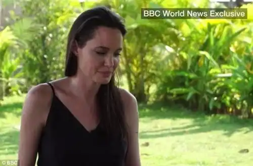Emotional interview: Angelina Jolie has spoken publicly for the first time about her split from Brad Pitt telling the BBC: 'It was a very difficult time.... and we will always be a family'