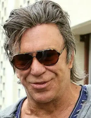 Suspicious Minds: Will not have been fooled by Mickey's spectacular Elvis-esque hairpiece