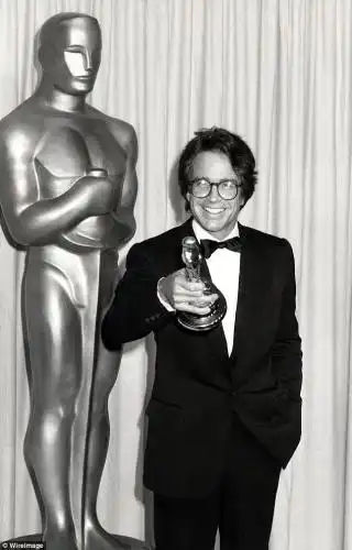 Hanging with the big man: Warren and his Best Director Oscar for Reds in 1981. As a producer, he also picked up the Irving G. Thalberg Oscar for achievement in 2000