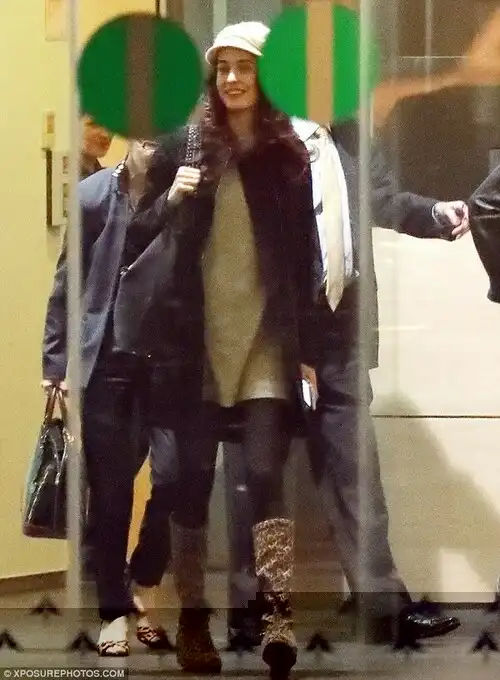 Glowing: The Lebanese-British lawyer showed off her baby bump in casual outfit 