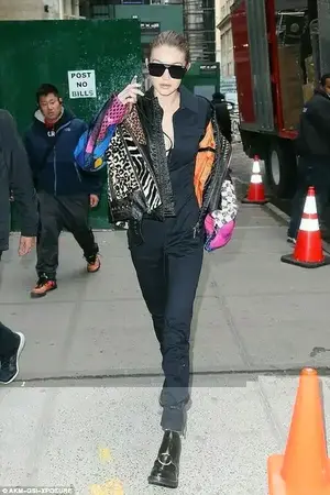Wow: Her jacket included zebra, leopard and cheetah patterns, along with checkers, studs, and vivid pinks and blues besides
