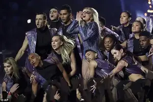 Here us now: Once onstage, she commanded a large troupe of dancers and musicians, props that breathed fire and audience members swinging lights in synchronization