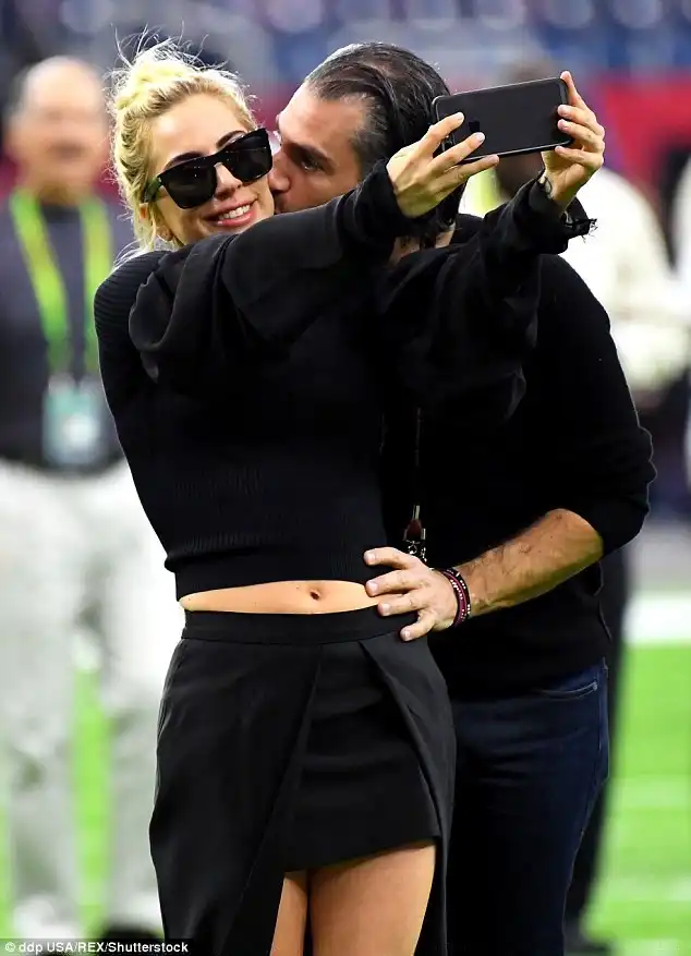 New boo! Gaga has been spotted getting affectionate with CAA agent Christian Carino, 48