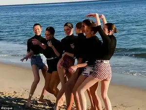 Strike a pose: The ladies wore black turtlenecks with colorful patterned shorts for the Malibu shoot