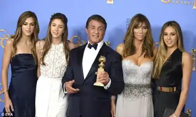 Out with his girls: Sly and his wife Jennifer Flavin and their daughters Sophia, 20, Scarlet 14, and Sistene, 18, at the Golden Globes awards in Beverley Hills in January 2016