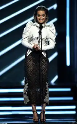 Monochrome madness: Rita Ora pulled faces as she presented 