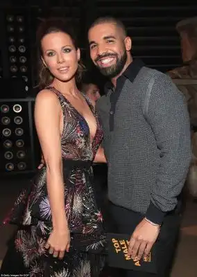 Eyes on the prize: Drake proudly posed with Kate backstage 