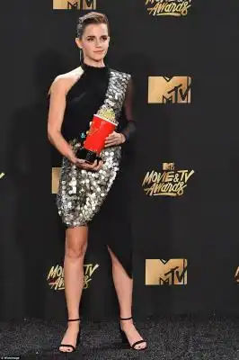 Had things to say: 'I’m so proud to be a part of a film that celebrates diversity, literacy, inclusion, joy, and love the way that this one does,' Watson said of winning her Golden Popcorn trophy for Belle