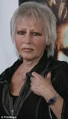 Salvo: Judy Haim (L) called Corey Feldman, 46, a 'con man' amid the actor's recent attempts to drum up million for an expose on child molesters holding high positions of power in Hollywood