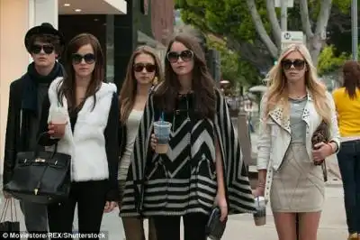 Rowdy teens: In 2009 the star's home was targeted by a group of teenage thieves, which inspired the plot of 2013 movie The Bling Ring, starring Emma Watson (second left)
