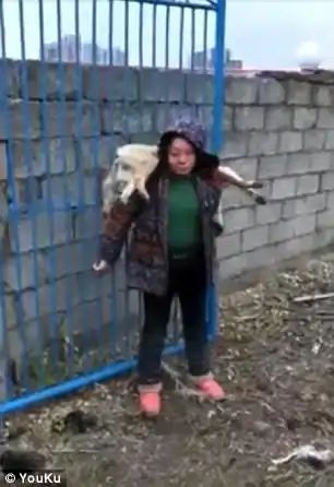 Angry villagers then put the dog's dead body onto her shoulder and leaves her publicly shamed