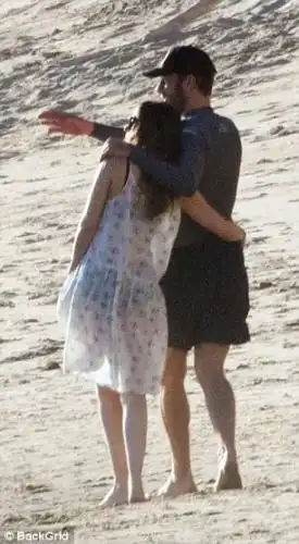 Inseparable: The artist appeared to point something out to the actress mid-stroll