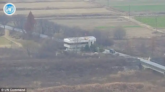 Once the soldier reached the foot of the bridge (far right) and past the guard post, he picked up speed and made a mad dash across the border in a Korean People's Army (KPA) Jeep