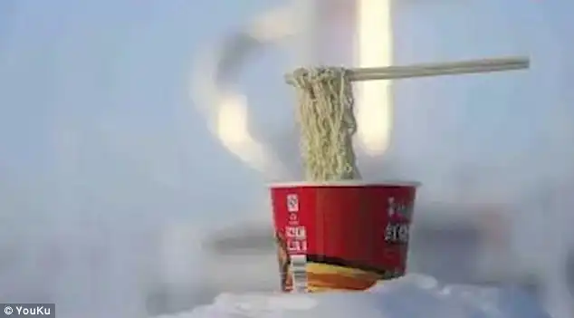 Wang makes an instant noodle but the cold weather has frozen the soup in split seconds