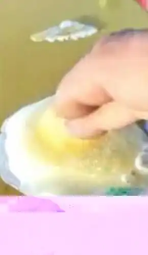 He hits the egg to show how quick the egg turns frozen