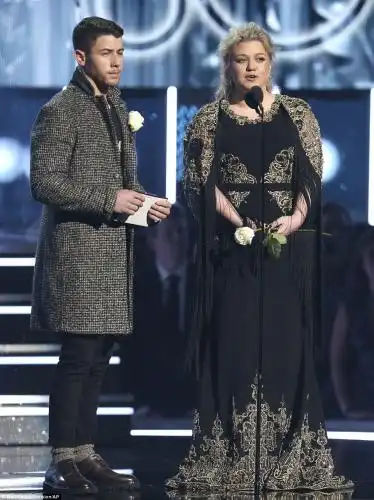 Just the two of us: Nick Jonas and Kelly Clarkson presented the Best New Artist a