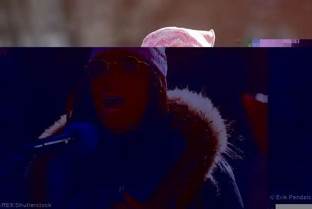Her side of things: Top Chef star Padma Lakshmi wore a pink hat and glasses in NYC