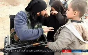 Parting: The image shows a young girl crying as she says goodbye to her terrorist father before he allegedly carried out a suicide bombing