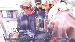 Terrorists: The man is seen being carried by two other fighters into a nearby vehicle